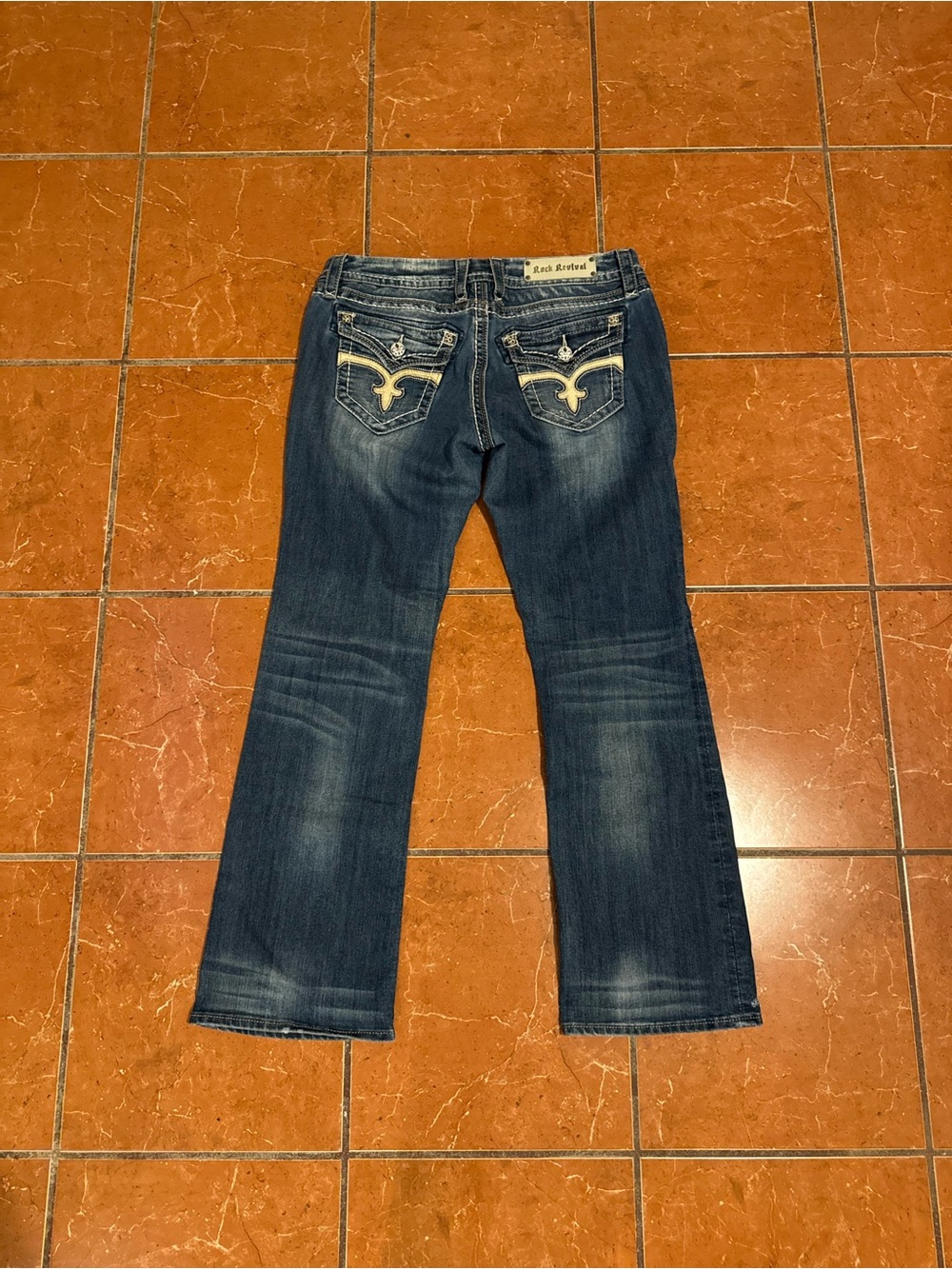 Rock Revival Boot Cut Jeans in Faded Blue with Contrasting Pocket Embroidery
